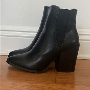 Heeled black booties *never worn